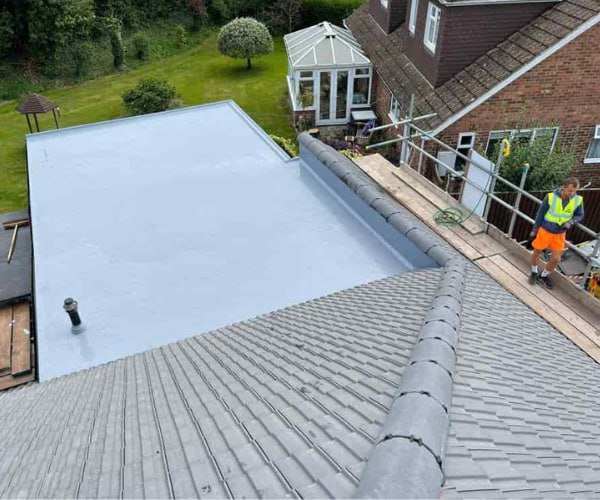 This is a photo of a newly installed hip roof, with a combined liquid covered flat roof. Work carried out by EA Roofing Daventry