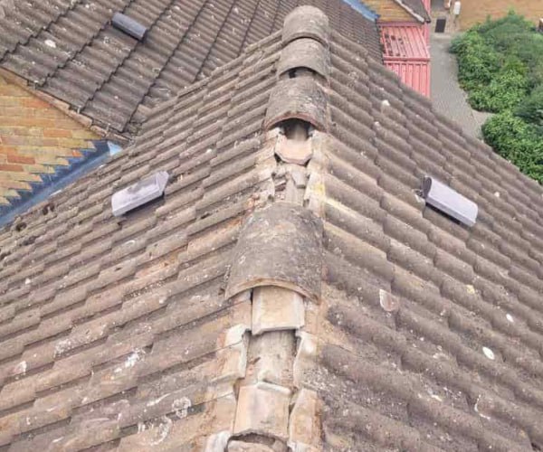 This is a photo if a roof ridge which has missing tiles. The ridge tiles are being replaced by EA Roofing Daventry